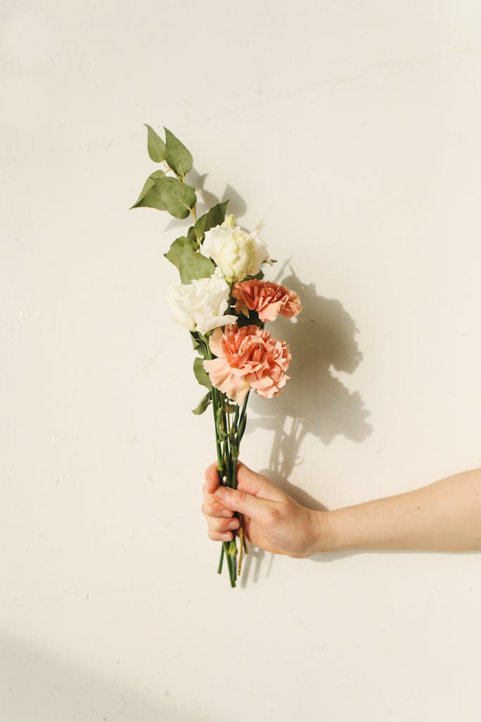 Person Holding Flowers 