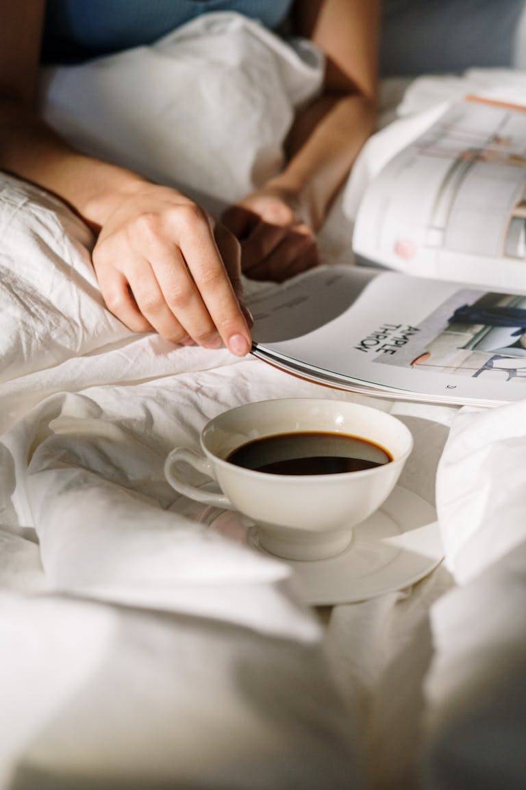 woman in bed after waking early and practicing selfcare